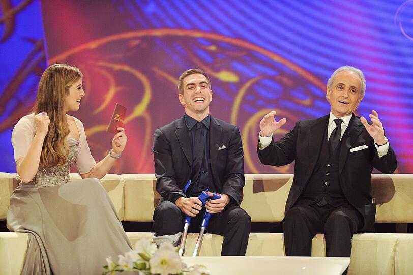 Philipp Lahm mit José Carreras und Nina Eichinger.