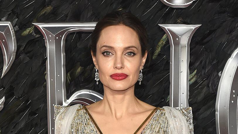Bei der Premiere von "Maleficent: Mächte der Finsternis" in London erschien Angelina Jolie in einem glamourösen weißen Kleid