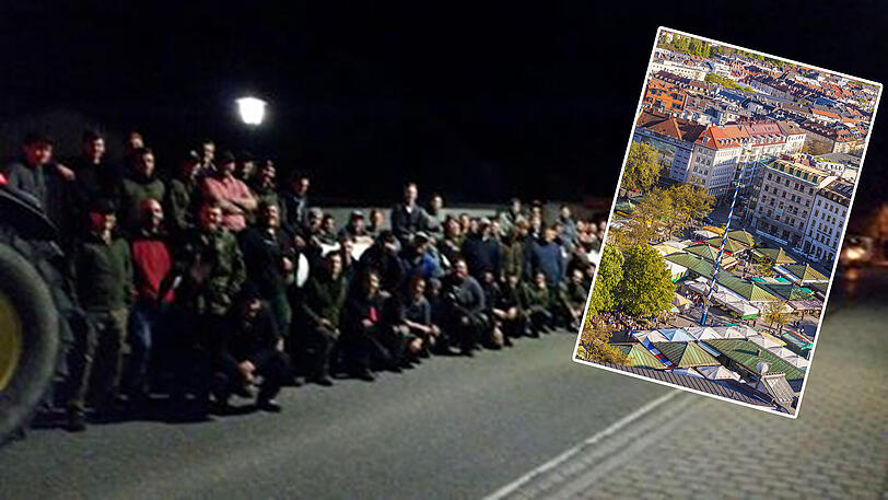 Das etwas unscharfe Beweisfoto zeigt die Mitglieder der Burschenvereine vor dem gestohlenen Baum. Er soll am 1. Mai am Viktualienmarkt aufgestellt werden.