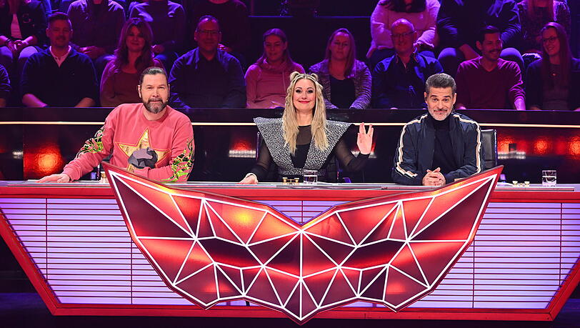 Ruth Moschner (Mitte), mit Rea Garvey (links) und Rick Kavanian (rechts) bei "The Masked Singer". Ruth Moschner (Mitte), mit Rea Garvey (links) und Rick Kavanian (rechts) bei "The Masked Singer".