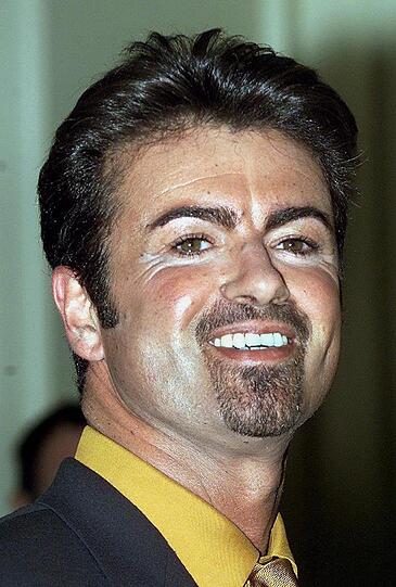 George Michael im Jahr 1999 bei einem Fototermin in London.