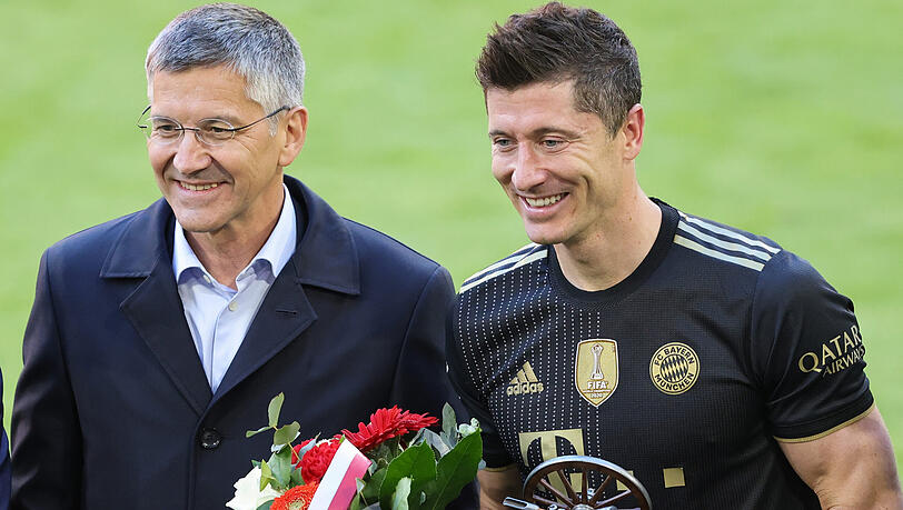 Bayern-Präsident Herbert Hainer (l.) und Robert Lewandowski.