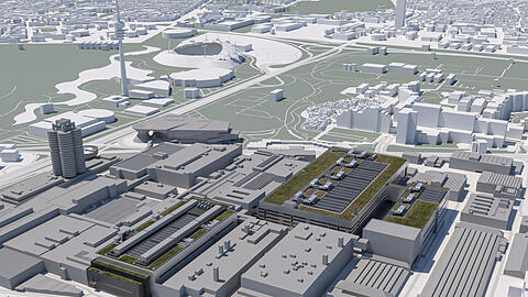 Eine Visualisierung zeigt, wie das Stammwerk von BMW in wenigen Jahren aussehen wird: Unten im Bild befindet sich der neue Karosseriebau, oben die geplante Montagehalle mit Logistik. Die beiden Gebäude ermöglichen ab 2026 die Produktion moderner Autos.