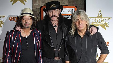 Lemmy Kilmister (Mitte) mit seinen Bandkollegen Phil Campbell (l.) und Mikkey Dee