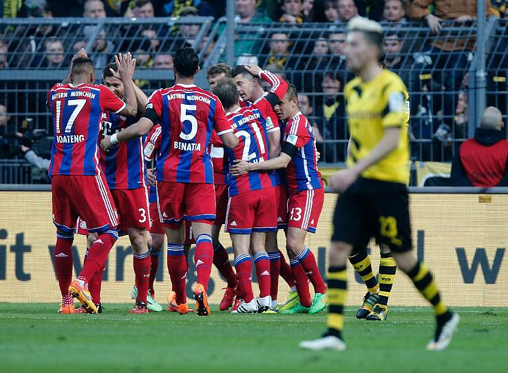 Der Dortmunder Kampl ist bedient, die Bayern freuen sich über den 1:0 Siegtreffer im Bundesligaspiel am 4. April 2015.