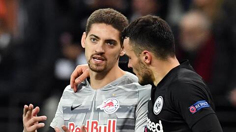 Der Frankfurter Filip Kostic (r) und Salzburg-Torhüter Cican Stankovic treffen diesen Donnerstag noch nicht aufeinander.