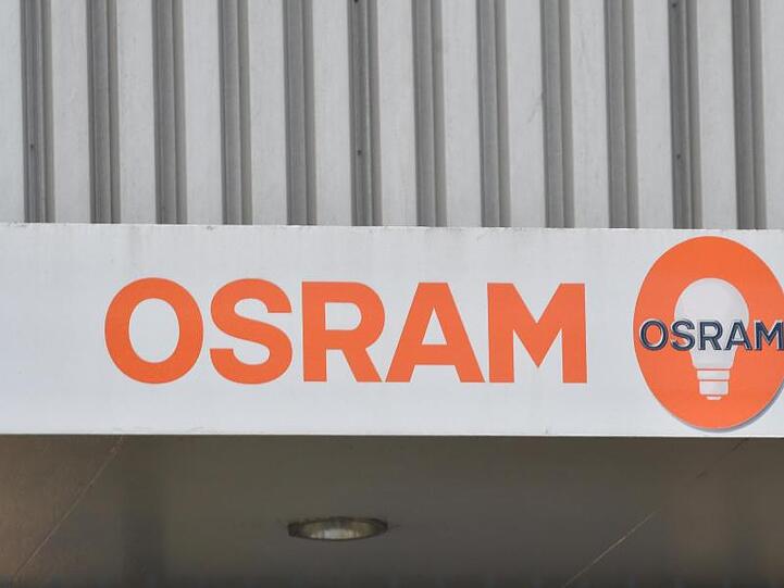 "Osram" steht über dem Eingang zu einem Werk. Foto: Paul Zinken/Archiv