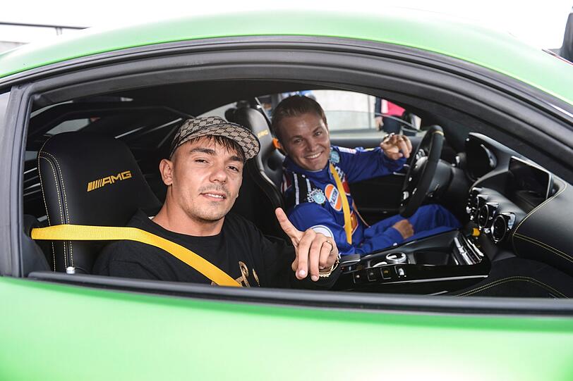 Capital Bra und Nico Rosberg.