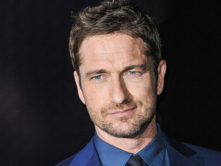 Gerard Butler arrives at the Ermenegildo Zegna Boutique opening on Thursday, Nov. 7, 2013 in Beverly Hills, Calif.