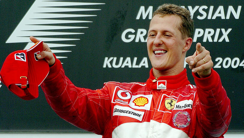Ein besessener Rennfahrer: Michael Schumacher nach seinem Sieg beim Großen Preis von Malaysia im Jahr 2004. Ein besessener Rennfahrer: Michael Schumacher nach seinem Sieg beim Großen Preis von Malaysia im Jahr 2004.