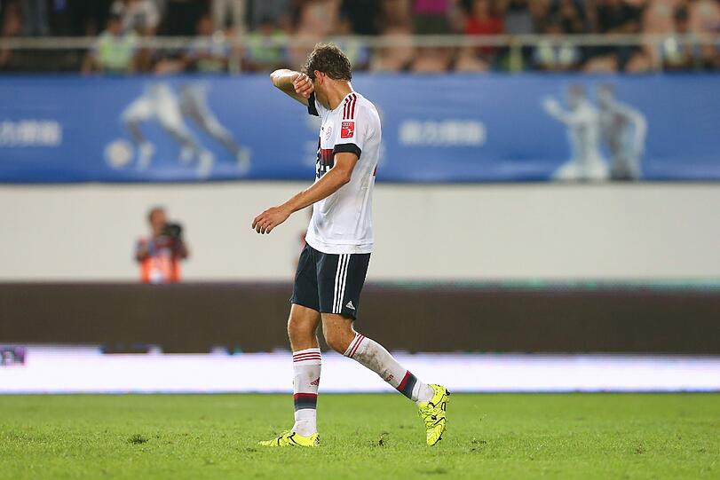 Im Freundschaftsspiel gegen Guangzhou Evergrande musste sich der FC Bayern im Elfmeterschießen geschlagen geben. Die Bilder zum Finale der China-Tour.