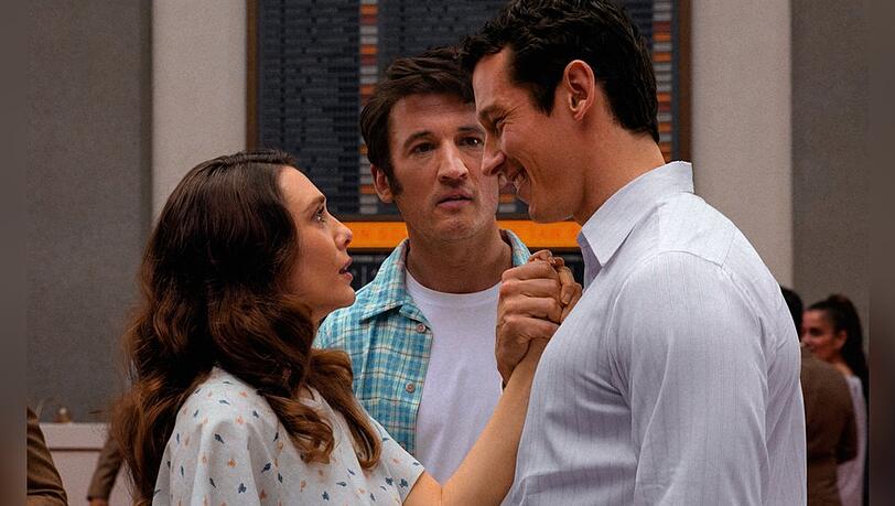 Joan (Elizabeth Olsen) trifft im Jenseits auf ihre beiden Ehemänner: Callum Turner (r.) und Miles Teller.