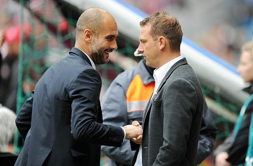 Verstehen sich gut: Bayern-Trainer Pep Guardiola und Augsburgs Markus Weinzierl.