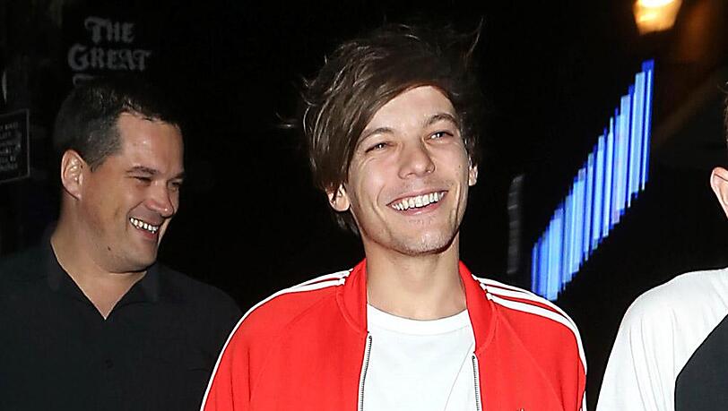 Für das "Fifa 15-Spiel kauft Louis Tomlinson virtuelle Münzen auf dem Schwarzmarkt. Für das "Fifa 15-Spiel kauft Louis Tomlinson virtuelle Münzen auf dem Schwarzmarkt.