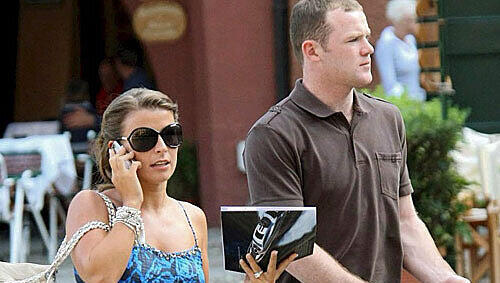 Coleen Rooney und ihr Ehemann, Englands Nationalstürmer Wayne Rooney (Manchester United). Coleen Rooney und ihr Ehemann, Englands Nationalstürmer Wayne Rooney (Manchester United).