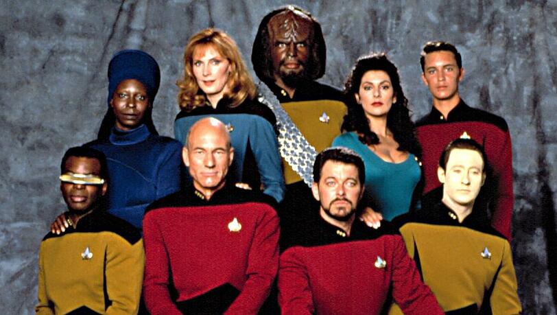 LeVar Burton, Patrick Stewart, Jonathan Frakes und Brent Spiner (vorne) sowie Whoopi Goldberg, Gates McFadden, Michael Dorn, Marina Sirtis und Wil Wheaton in "Star Trek: The Next Generation".
