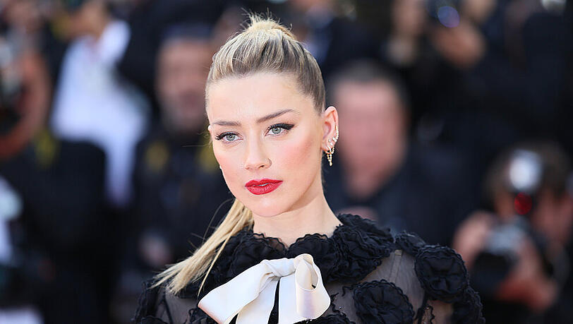 Amber Heard behält eine große Rolle. Amber Heard behält eine große Rolle.