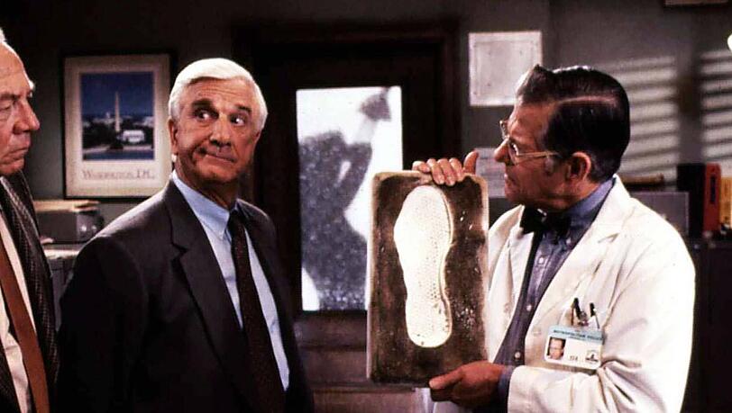 Ed Williams (r.) im Zusammenspiel mit Leslie Nielsen in "Die nackte Kanone 2½".