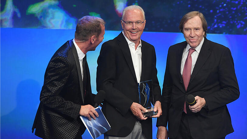 Franz Beckenbauer und Günther Netzer mit Moderator Markus Othmer.
