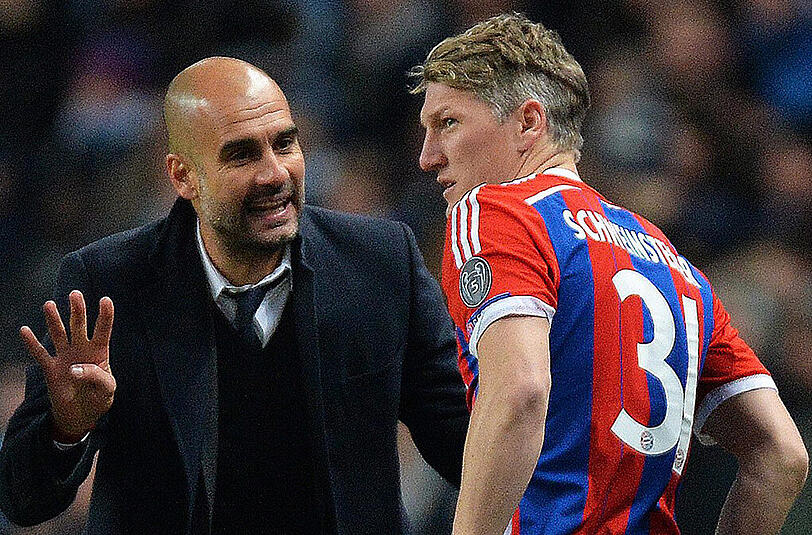 Bayern-Trainer Pep Guardiola (links) und der inzwischen zu Manchester United angewanderten Bastian Schweinsteiger.