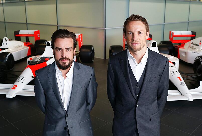 Wollen 2015 wieder durchstarten: Die Ex-Weltmeister Fernando Alosno (l.) und Jenson Button.