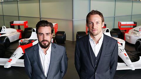 Wollen 2015 wieder durchstarten: Die Ex-Weltmeister Fernando Alosno (l.) und Jenson Button.