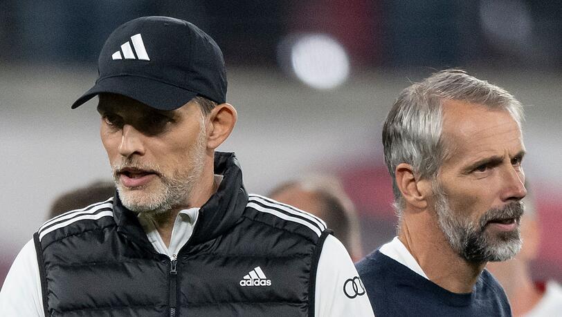 Bayern-Trainer Thomas Tuchel (l) und RB-Coach Marco Rose treffen am Samstag mit ihren Mannschaften aufeinander.
