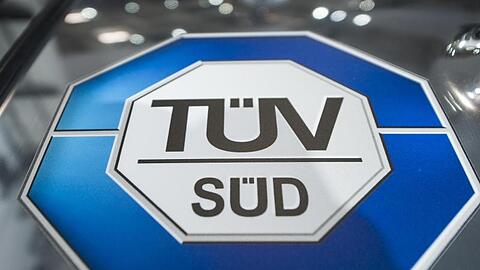 Das Logo des TÜV SÜD. Foto: picture alliance / Ole Spata/dpa/Archivbild