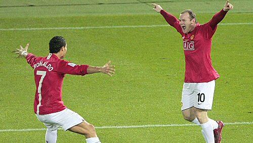 Klub-Weltmeister: Torschütze Rooney (r.) jubelt mit Ronaldo Klub-Weltmeister: Torschütze Rooney (r.) jubelt mit Ronaldo
