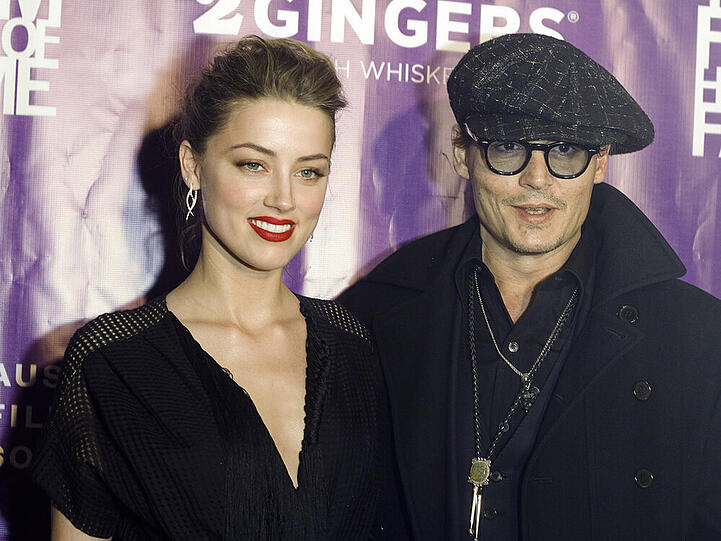Amber Heard und Johnny Depp  trennen 23 Jahre. Aber es verbindet sie auch viel. Inzwischen sind sie sogar verlobt.