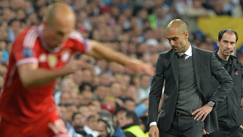 Arjen Robben (l.) und Pep Guardiola - auch sie haben noch Zuversicht nach der 0:1-Niederlage im Hinspiel des Champions-League-Halbfinales bei Real Madrid. Arjen Robben (l.) und Pep Guardiola - auch sie haben noch Zuversicht nach der 0:1-Niederlage im Hinspiel des Champions-League-Halbfinales bei Real Madrid.
