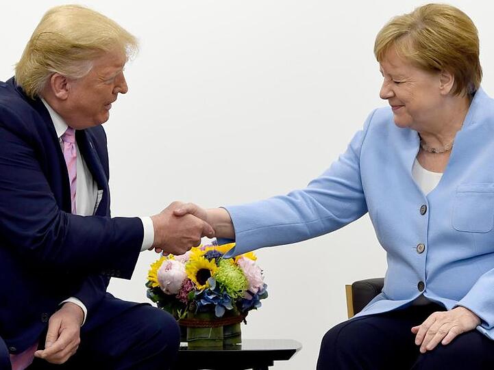 Was will uns die Mimik der Kanzlerin sagen? Angela Merkel und US-Präsident Donald Trump beim G20-Gipfel.