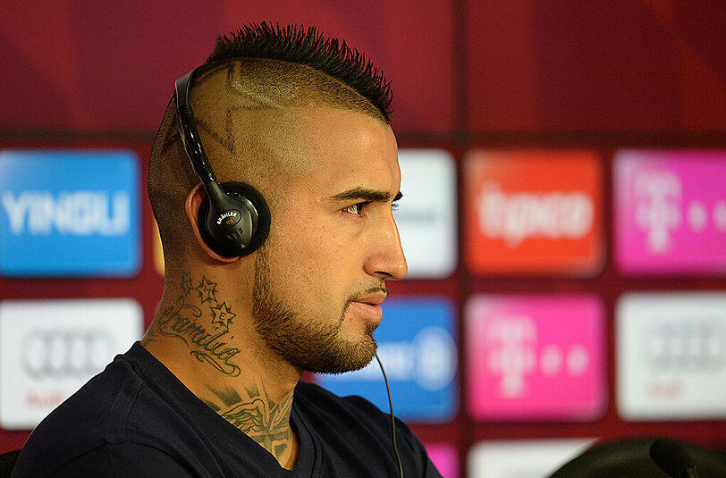 Der "Krieger" ist da: Arturo Vidal hat beim FC Bayern München einen Vierjahresvertrag unterschrieben. Klicken Sie sich durch die Bilderstrecke von Vidals ersten Tagen in München.