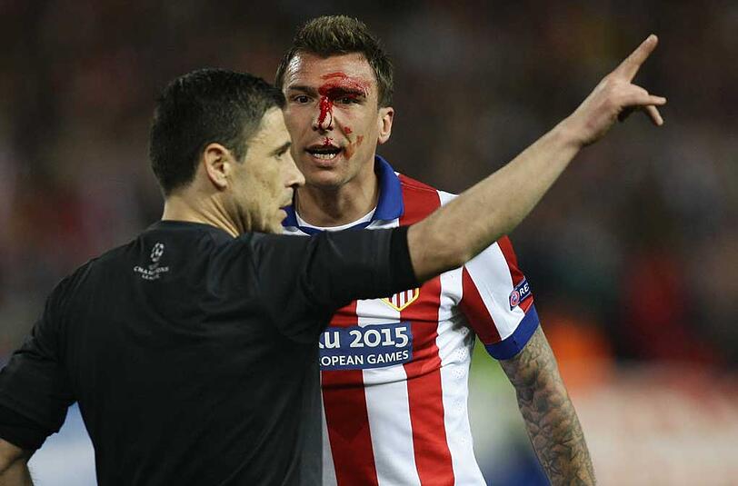 Mario Mandzukic bekam einiges ab im Stadt-Derby der Champions League zwischen Atletico und Real Madrid.