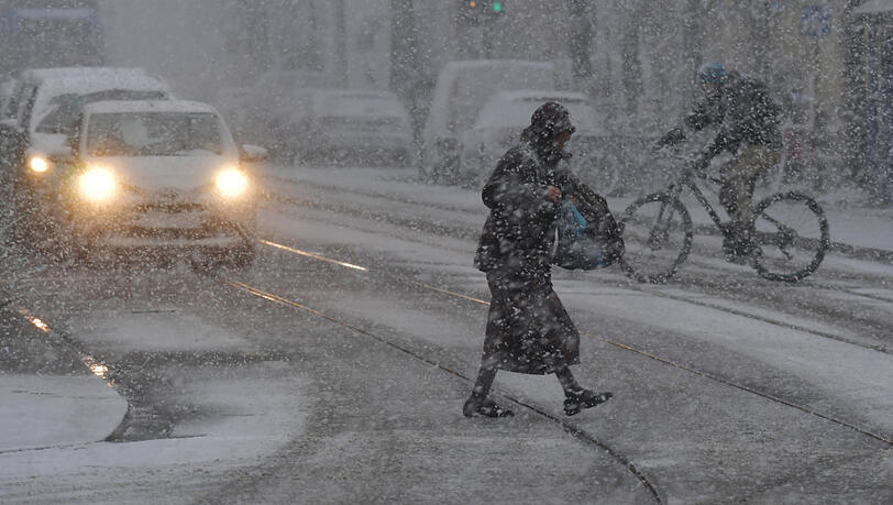 Schneetreiben am Montagmorgen: Sturmtief Eberhard ist in München angekommen. Schneetreiben am Montagmorgen: Sturmtief Eberhard ist in München angekommen.