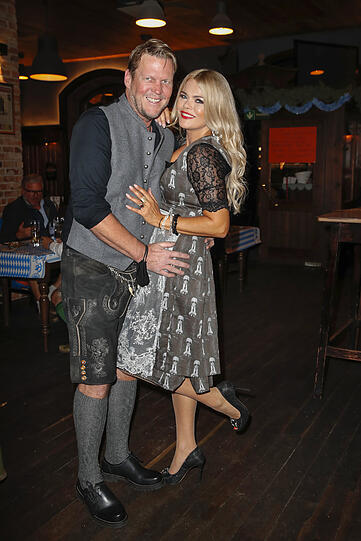 MUNICH, GERMANY - SEPTEMBER 26: Michael Tomaschautzki and Diana Herold, wearing limited edition Karl Lagerfeld dirndl dress designed by Marnali and Bachmaier during the "Marnali Art Meets Bachmaier" exhibition opening at Bachmaier Hofbraeu on September 26, 2020 in Munich, Germany. (Photo by Franziska Krug/Getty Images)