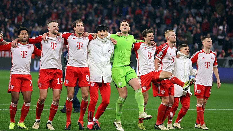 Feier-Bayern: Das Team um Manuel Neuer (M.) steht im Viertelfinale der Champions League. Feier-Bayern: Das Team um Manuel Neuer (M.) steht im Viertelfinale der Champions League.