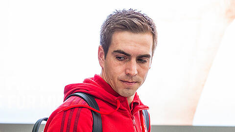 Philipp Lahm am Münchner Flughafen bei der Abreise ins Trainingslager.