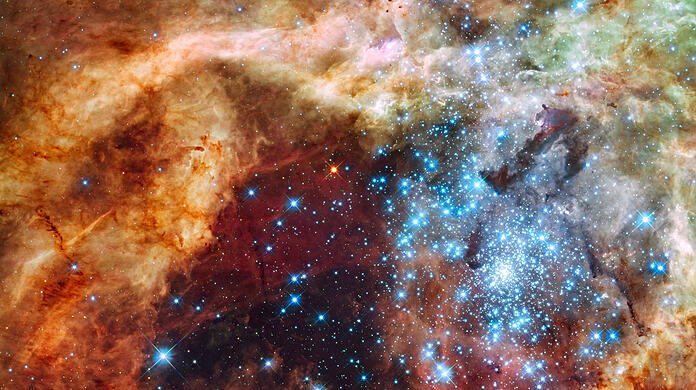 Hunderte blau strahlende Sterne. Das Bild zeigt die "größte stellare Kinderstube" unserer galaktischen Nachbarschaft so detailliert wie nie zuvor, schreibt das Space Telescope Science Institute im Jahr 2009. Klicken Sie durch die imposanten "Hubble"-Aufnahmen.