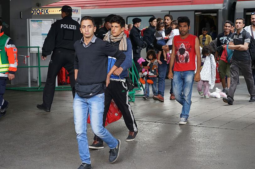 Flüchtlinge kommen am Hauptbahnhof München an.