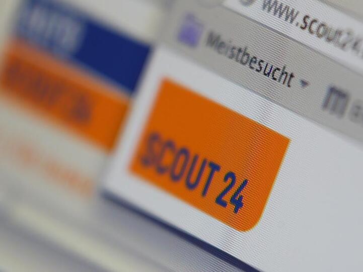 Verschiedene Internetseiten des Online-Marktplatzbetreibers Scout24 sind offen. Foto: Karl-Josef Hildenbrand/dpa/Archivbild