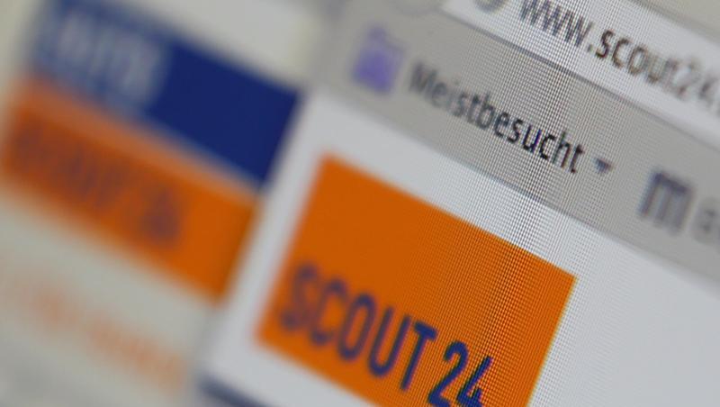Verschiedene Internetseiten des Online-Marktplatzbetreibers Scout24 sind offen. Foto: Karl-Josef Hildenbrand/dpa/Archivbild