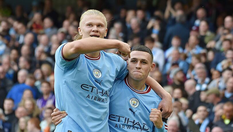 Erling Haaland (l) und Phil Foden trafen jeweils dreifach für Man City.