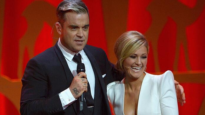 Sie kennen sich schon lange: Robbie Williams und Helene Fischer bei der Bambi-Verleihung im Jahr 2013.
