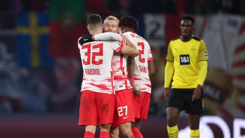 Leipzigs Spieler feiern den Sieg über den BVB. Leipzigs Spieler feiern den Sieg über den BVB.
