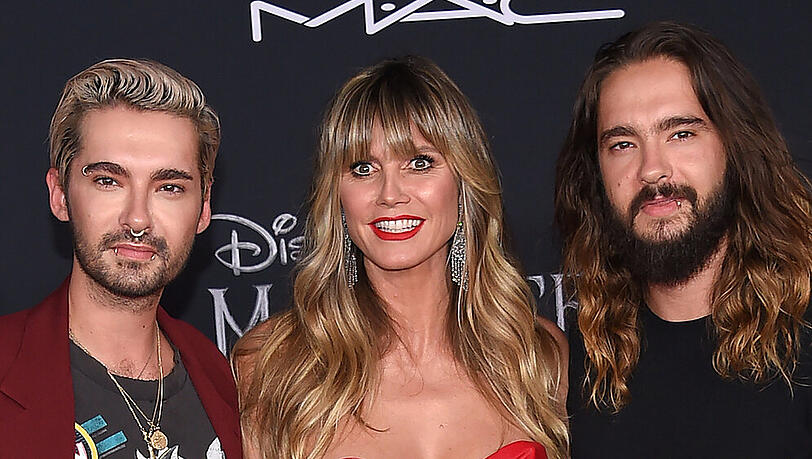Gemeinsam auf dem roten Teppich: Heidi Klum mit Ehemann Tom Kaulitz (r.) und dessen Zwillingsbruder Bill Kaulitz bei einer Veranstaltung Gemeinsam auf dem roten Teppich: Heidi Klum mit Ehemann Tom Kaulitz (r.) und dessen Zwillingsbruder Bill Kaulitz bei einer Veranstaltung