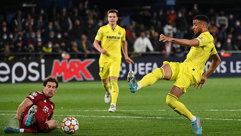 Münchens Leon Goretzka (l) in Aktiong gegen Villarreals Arnaut Danjuma. Münchens Leon Goretzka (l) in Aktiong gegen Villarreals Arnaut Danjuma.