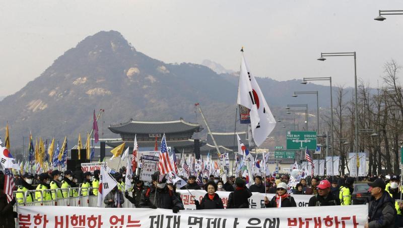 Demonstranten marschieren während einer Kundgebung zur Unterstützung der US-Politik in Seoul. Demonstranten marschieren während einer Kundgebung zur Unterstützung der US-Politik in Seoul.