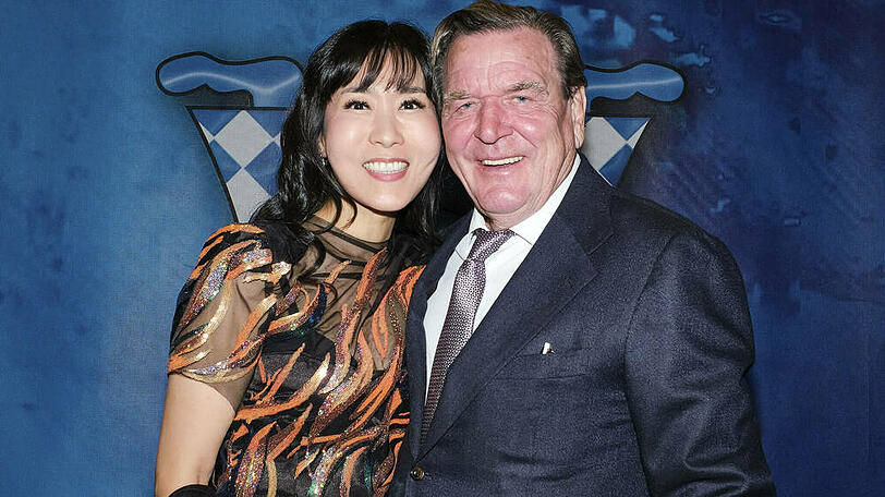 Gerhard Schröder mit seiner Ehefrau bei einem Auftritt in Hannover.