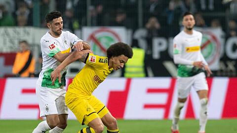 Gladbachs Lars Stindl (l) hatte im Topspiel gegen Axel Witsel und Borussia Dortmund das Nachsehen.